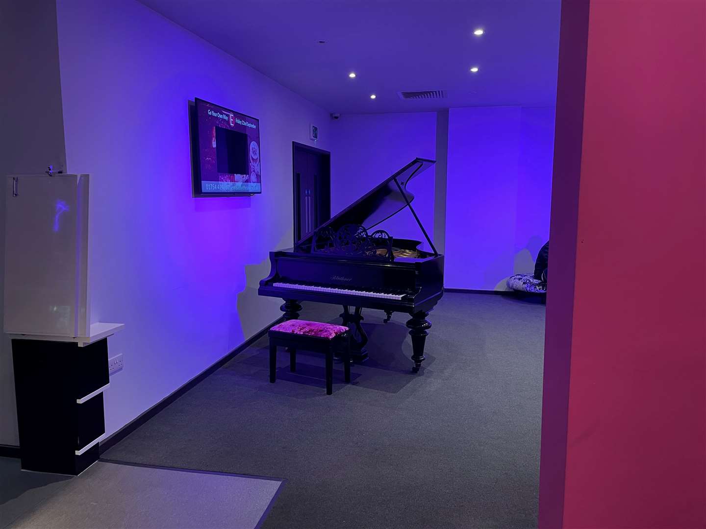 A piano nobody used. The space could have been better used for seating