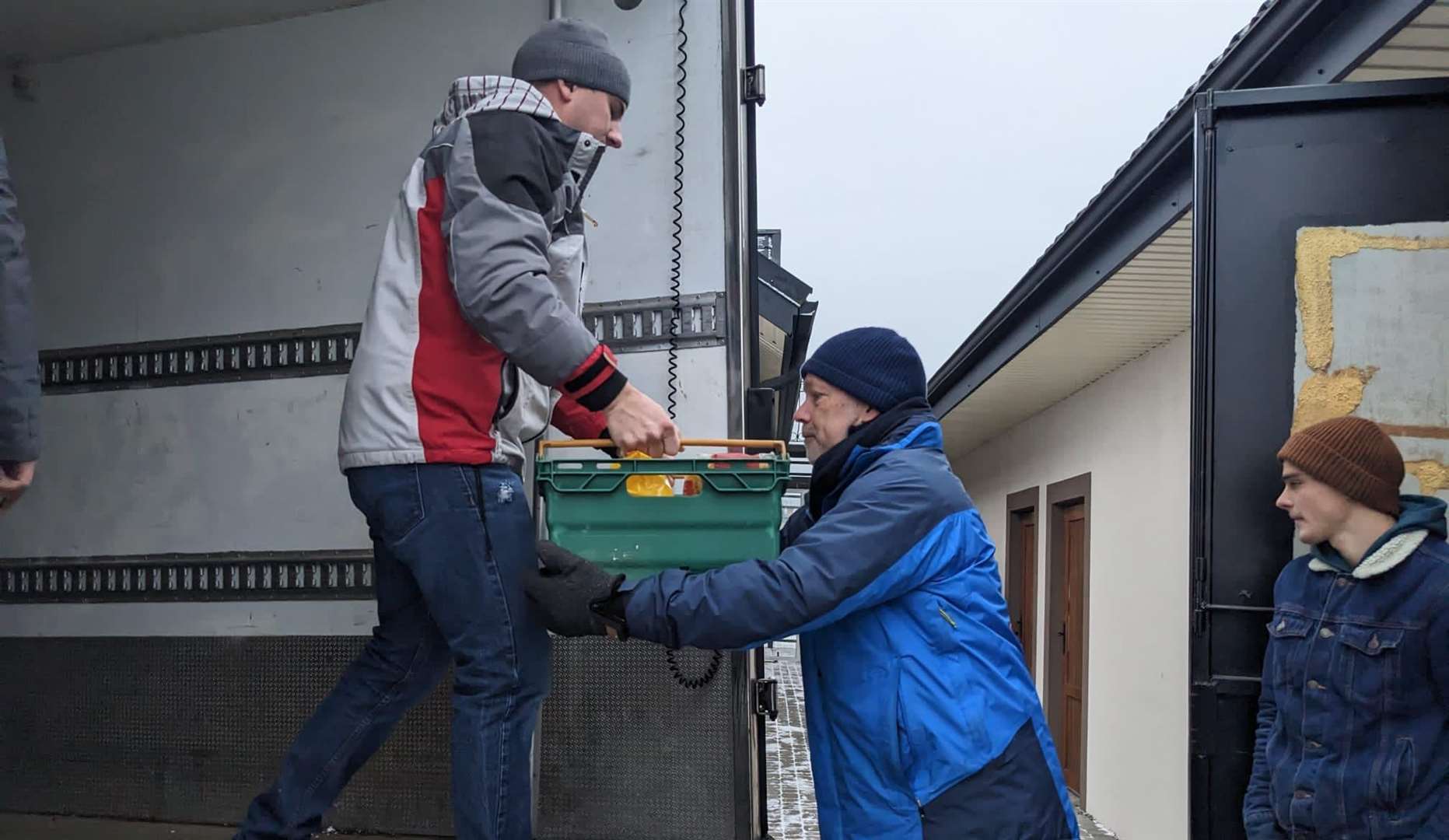 The team helps to unload supplies ready for transfer on to Polish lorries and taken into Ukraine