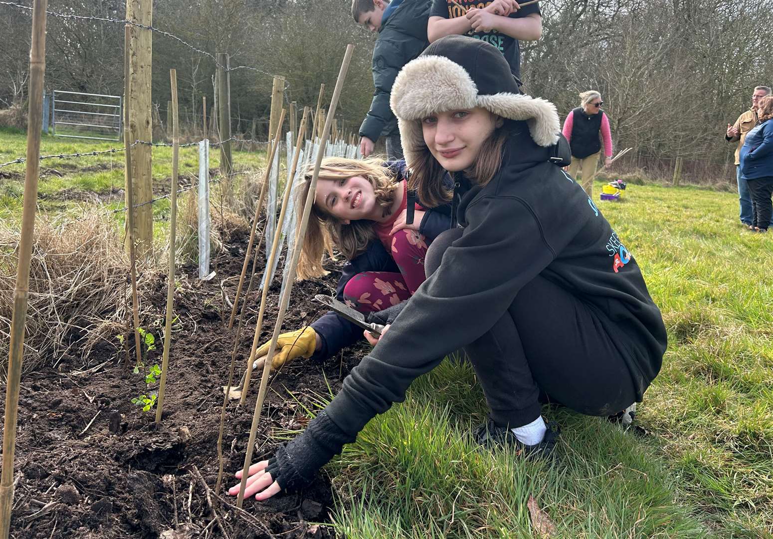 Eva Savory and Emmie Gui were keen to take part in the tree planting