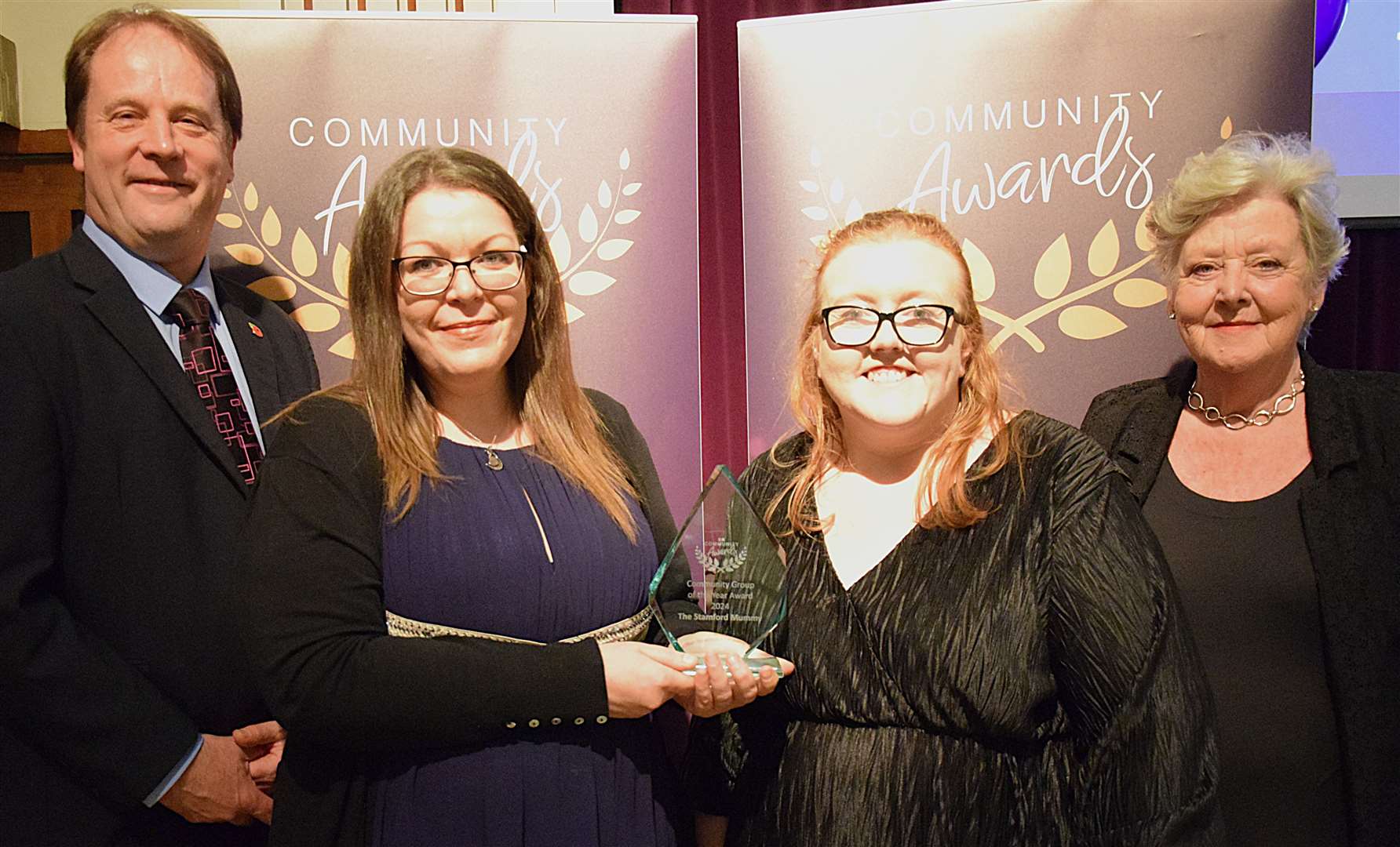 Councillor Ashley Baxter and Virginia Moran with Nicola Entwistle (left) and Caroline Killington-Parker of The Stamford Mummy, who won the Community Group of the Year Award