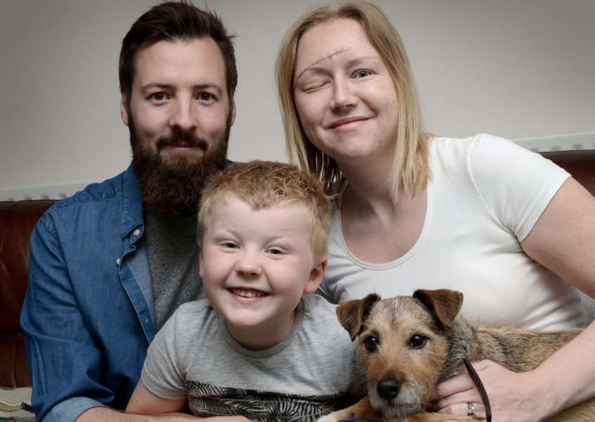Katie Addison-Snart with husband Rob, son Hugo and Ben the dog.