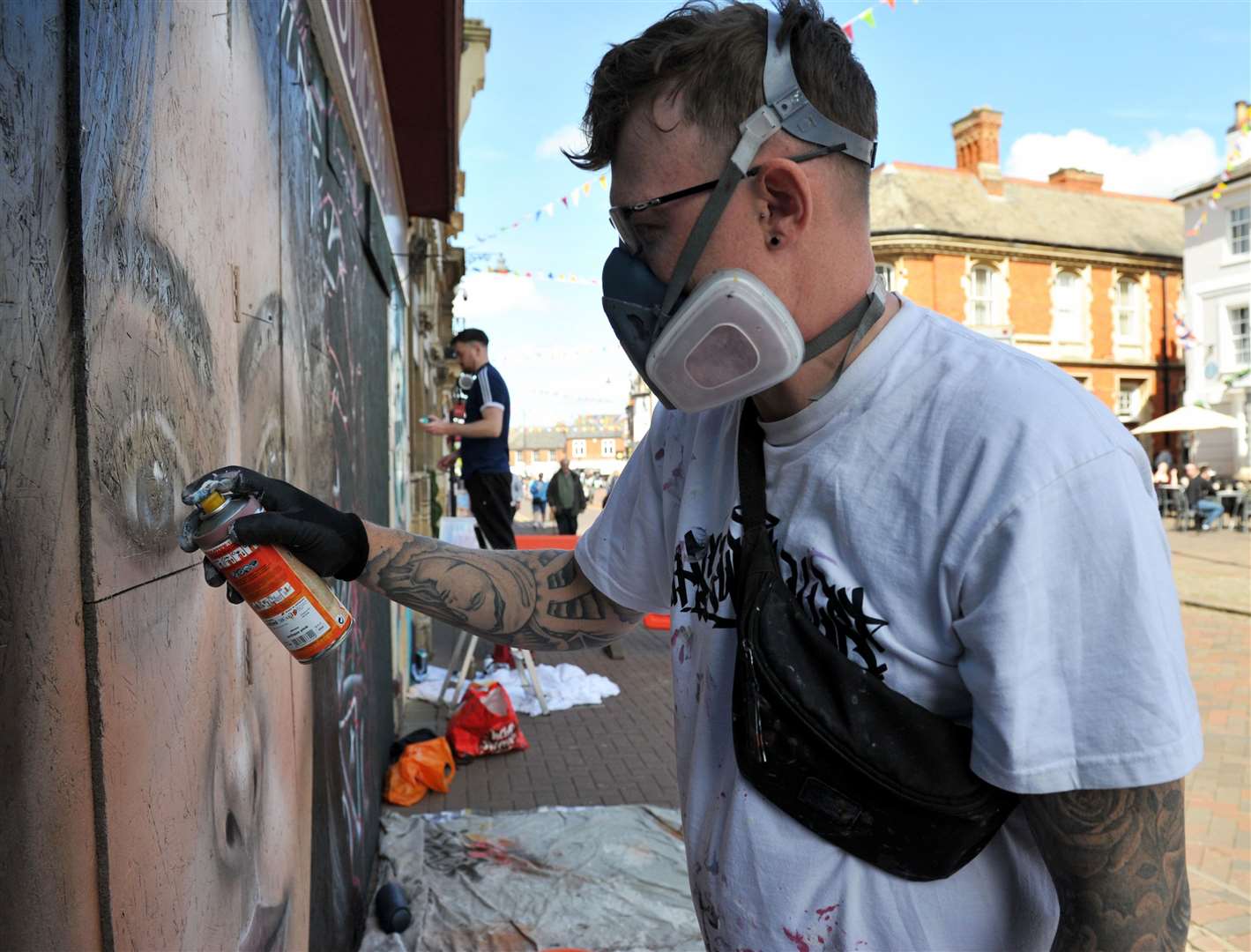 Karl Barfoot sets to work on the mural