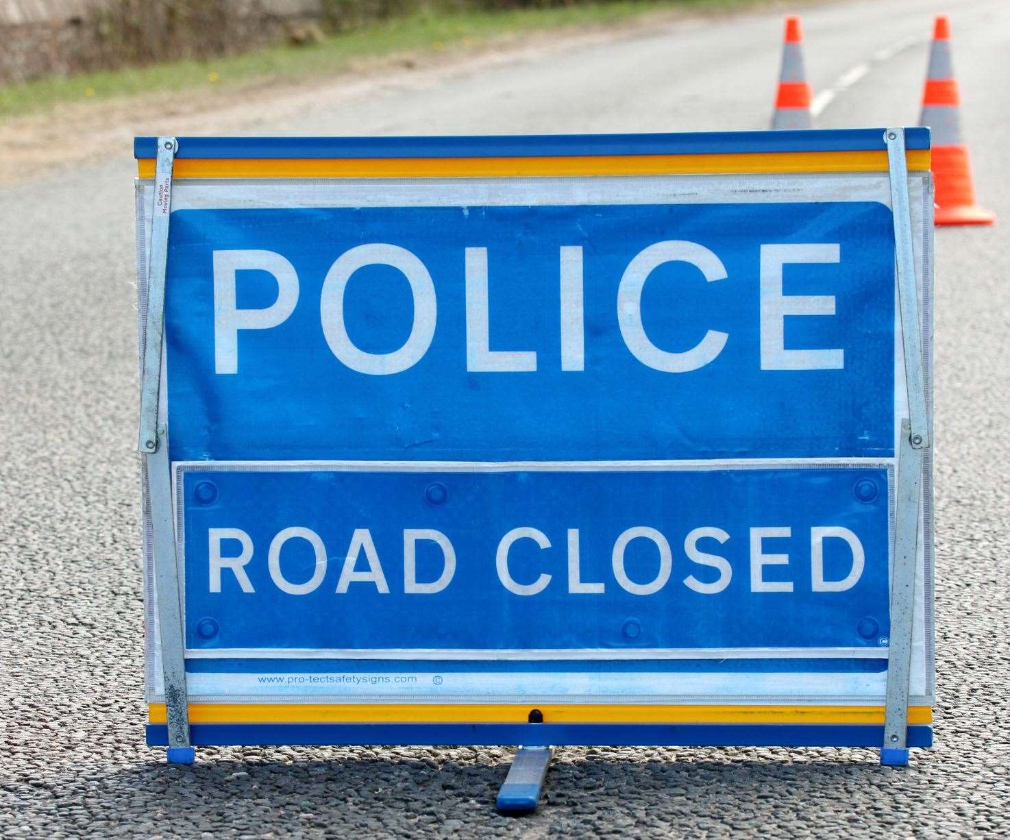 Police road closed sign.