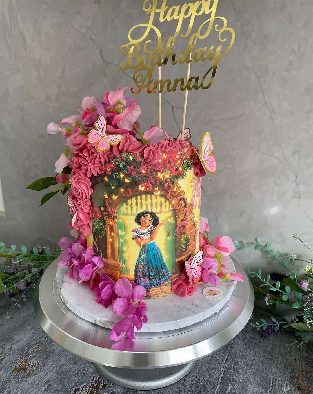 A beautiful Encanto themed cake