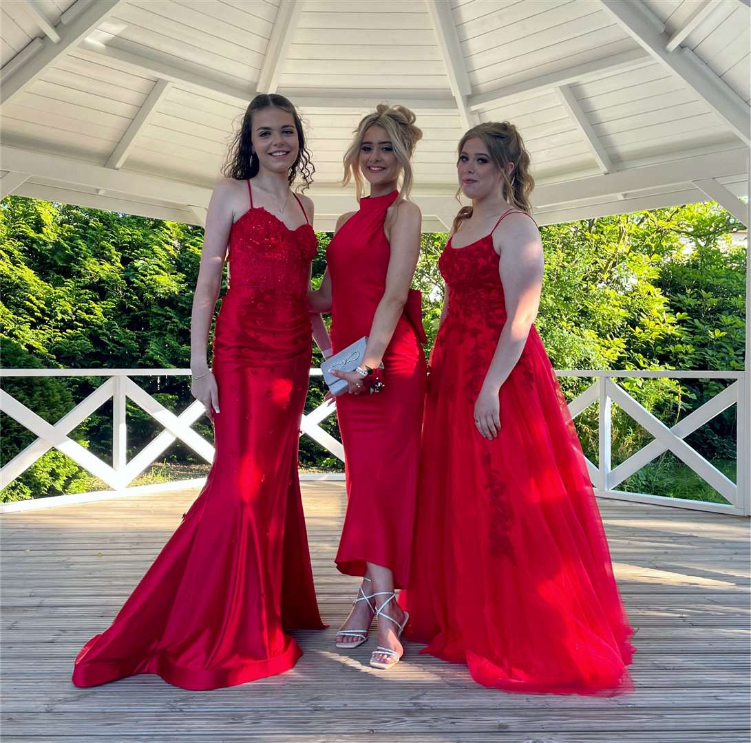 Ladies in red arrive at the Spalding Academy prom