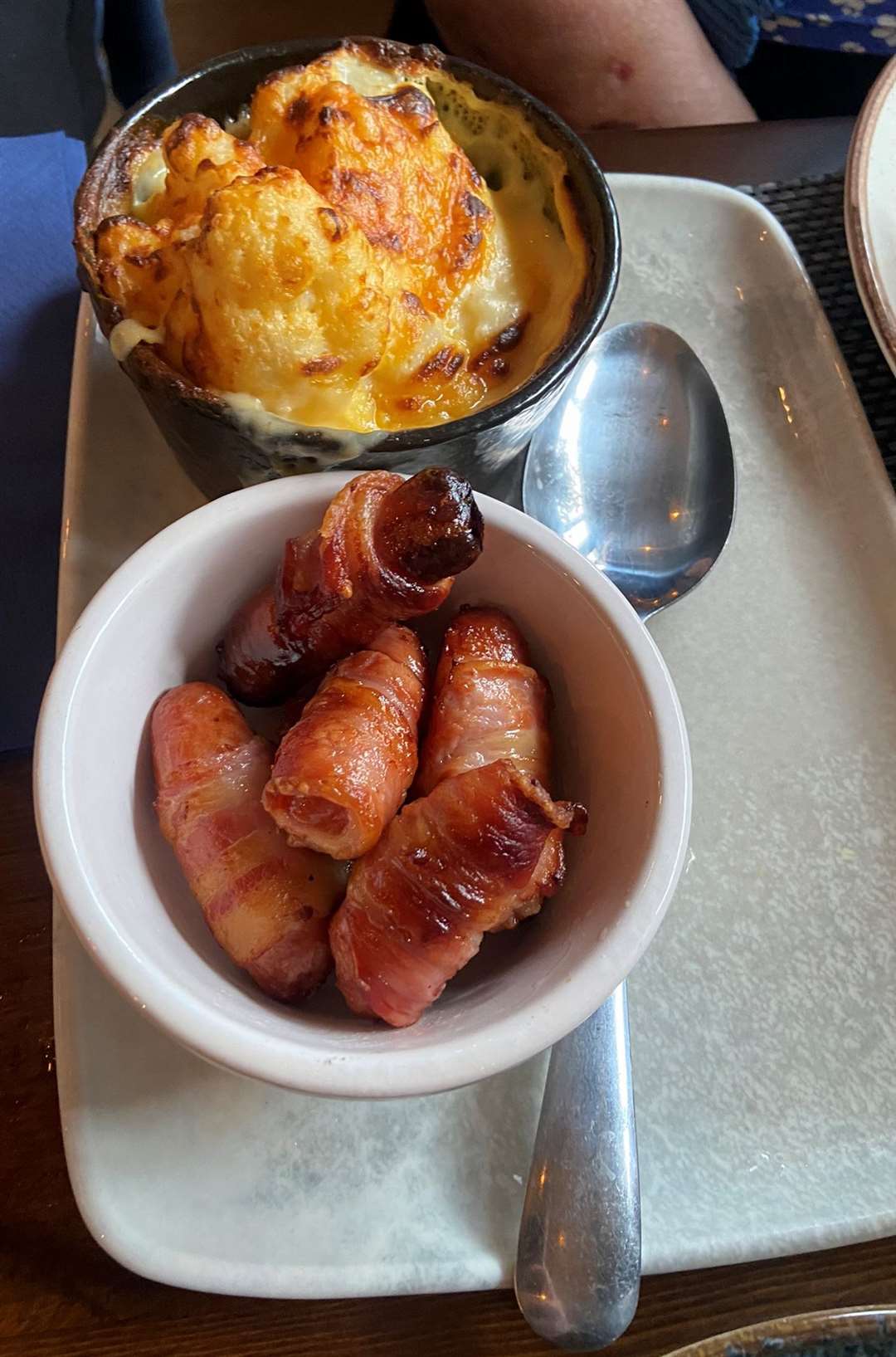 The sides of cauliflower cheese and pigs in blankets