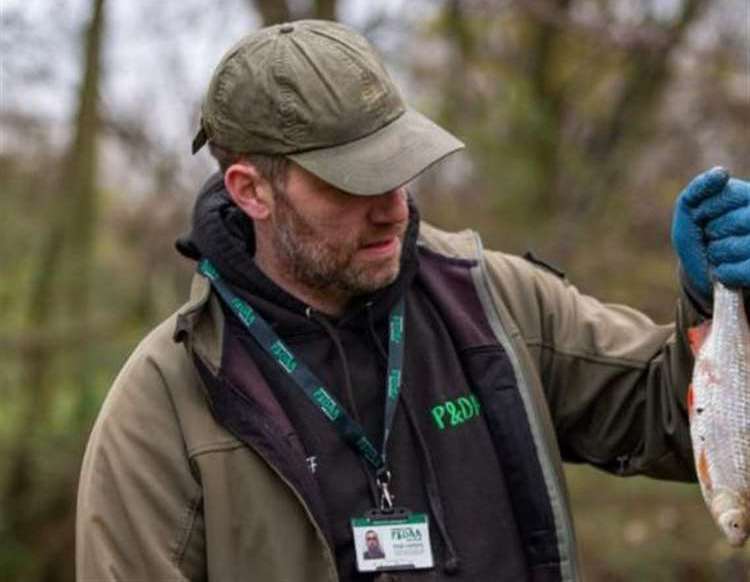 Rob Harris, chairman of Peterborough and District Angling Association, responds to an incident where a number of fish had died. PHOTO: SUBMITTED