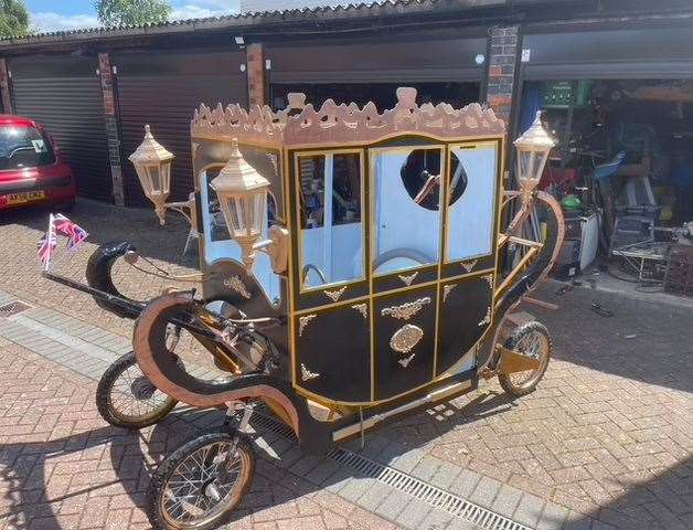 The team are hoping the actual royal family don't get too worried about seeing the carriage hurtling down the track. Photo: Supplied.