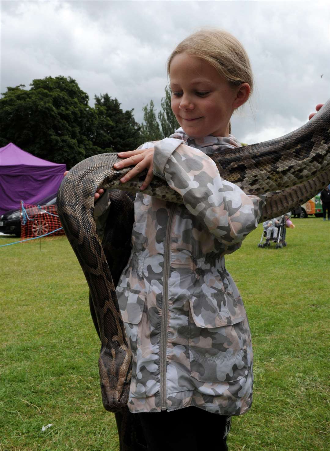 Florence Fraser-Betts with a snake on show. Photo: Chris Lowndes