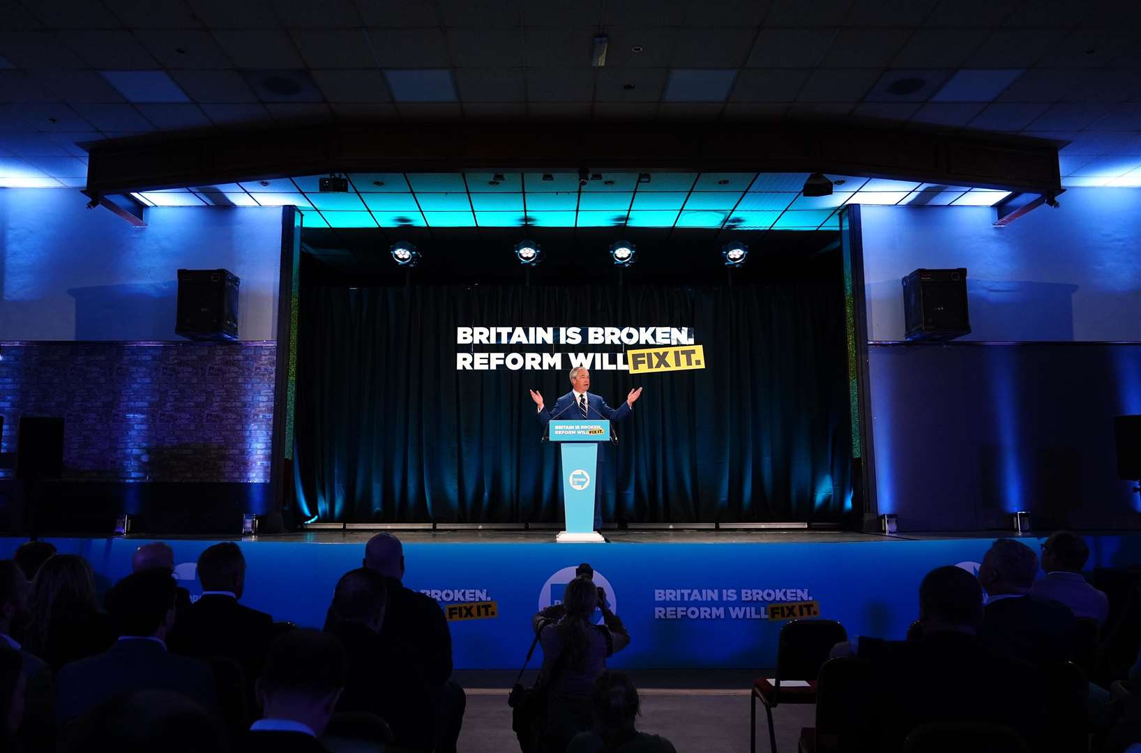 Reform UK leader Nigel Farage speaking at the Newton Aycliffe working men’s club in Durham (Owen Humphreys/PA)