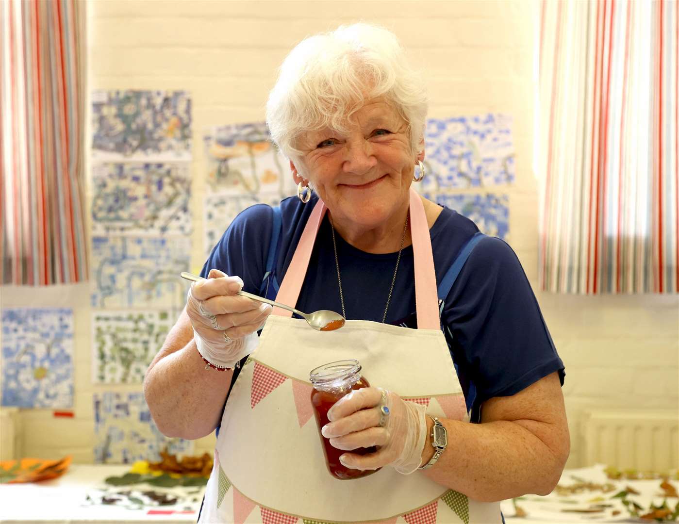 Tracey Wells, from the West Pinchbeck WI, judges the jams and pickles at West Pinchbeck Village Show