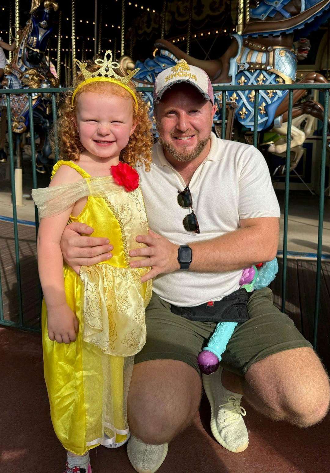 Daniel Lambert with daughter Ava and the 'silly coloured' bubble wand 'penis at Disneyland Paris.