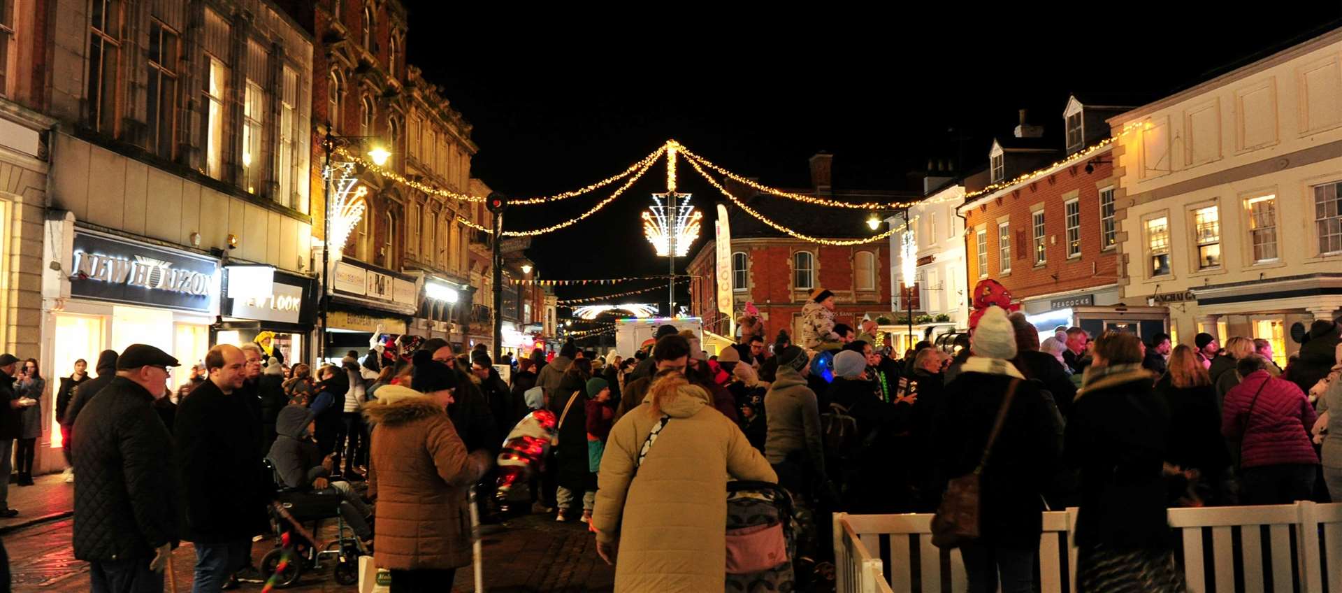 Crowds were feeling festive Photo: Chris Lowndes