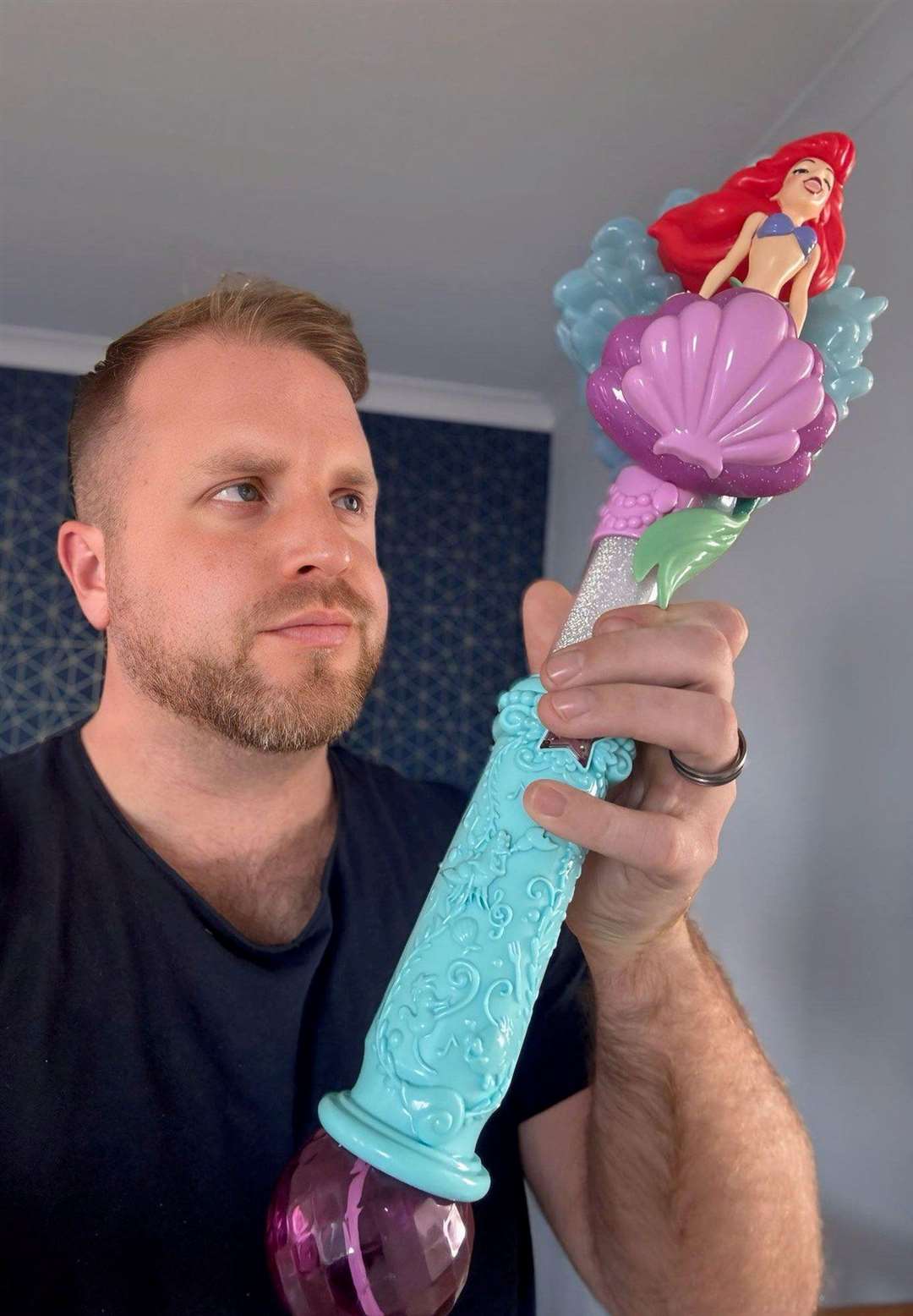 Daniel Lambert with the 'silly coloured' bubble wand 'penis'.