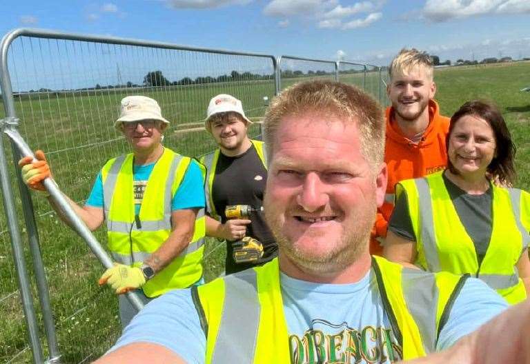 Event organiser Sean Taylor with friends and family are getting the field ready for this year's Holbeach Music and Beer Festival