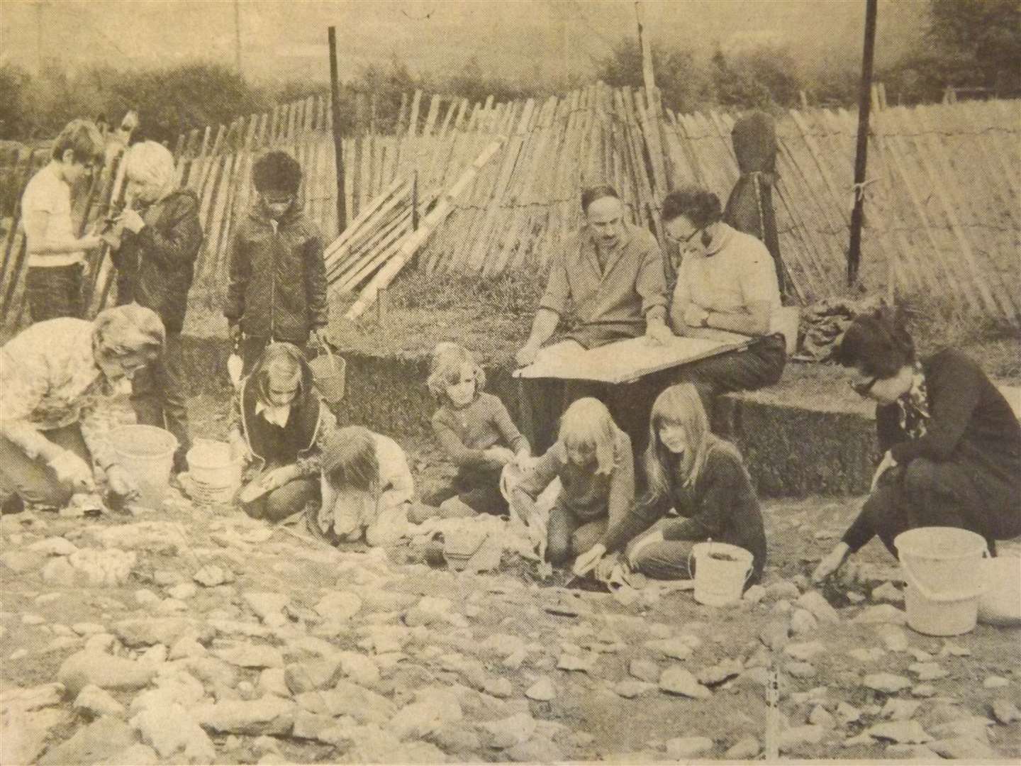 50 years ago: October 12, 1973 – Squadron Leader A. W. Adams (excavations director) discusses with Rutland Field Research Group chairman (Mr L. G. Emmerson) a plan of the site at Lower Hambleton. Helping with the dig on Saturday were children from Uppingham.