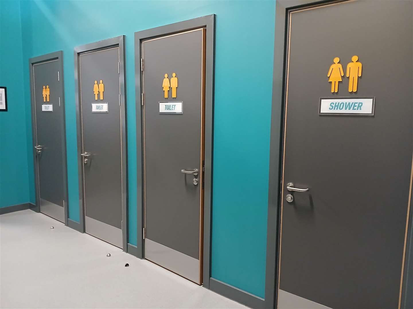 Toilets and a shower room in the changing area