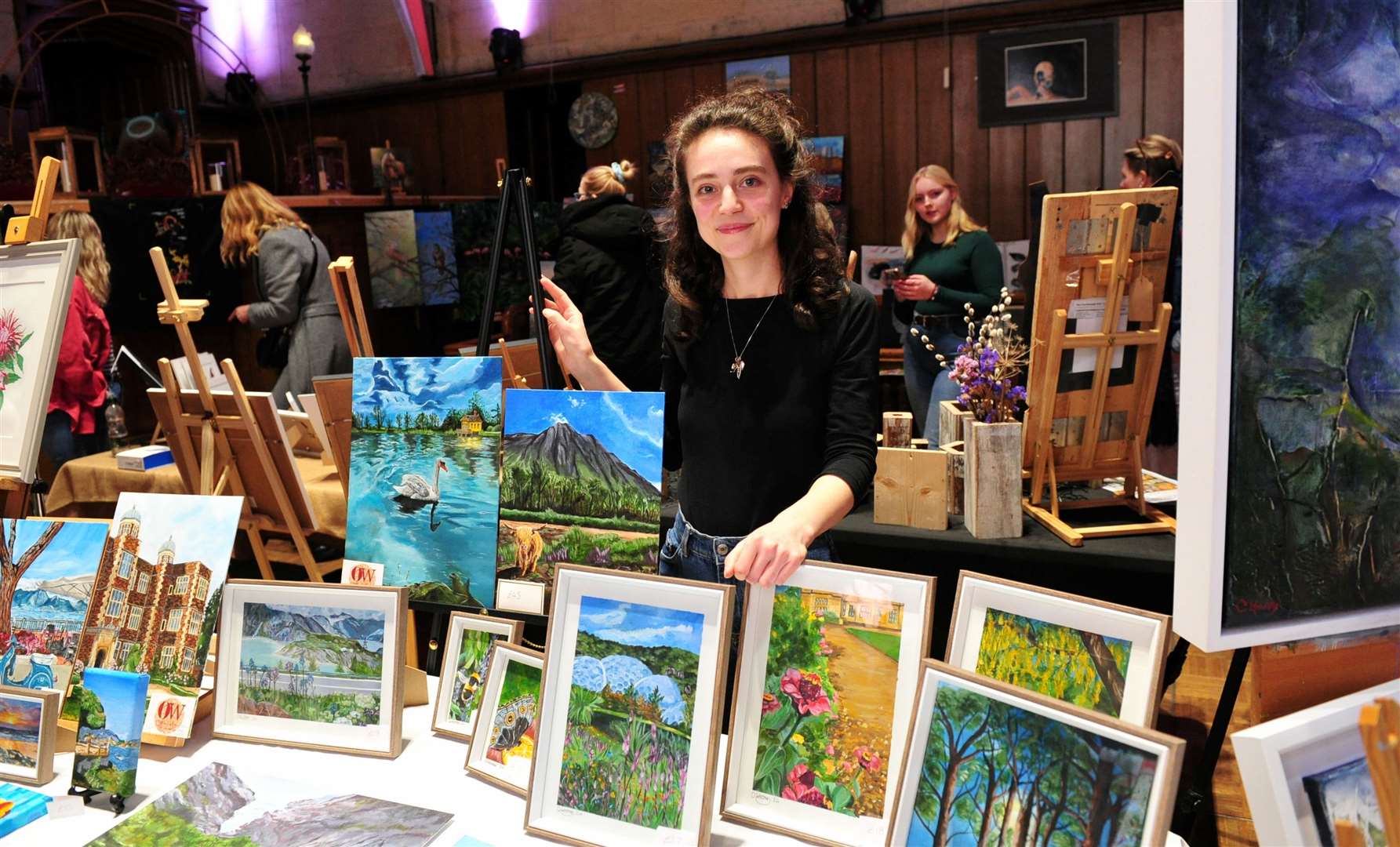 Artist, Olivia Walker showcasing her work at the exhibition PHOTO: Chris Lowndes