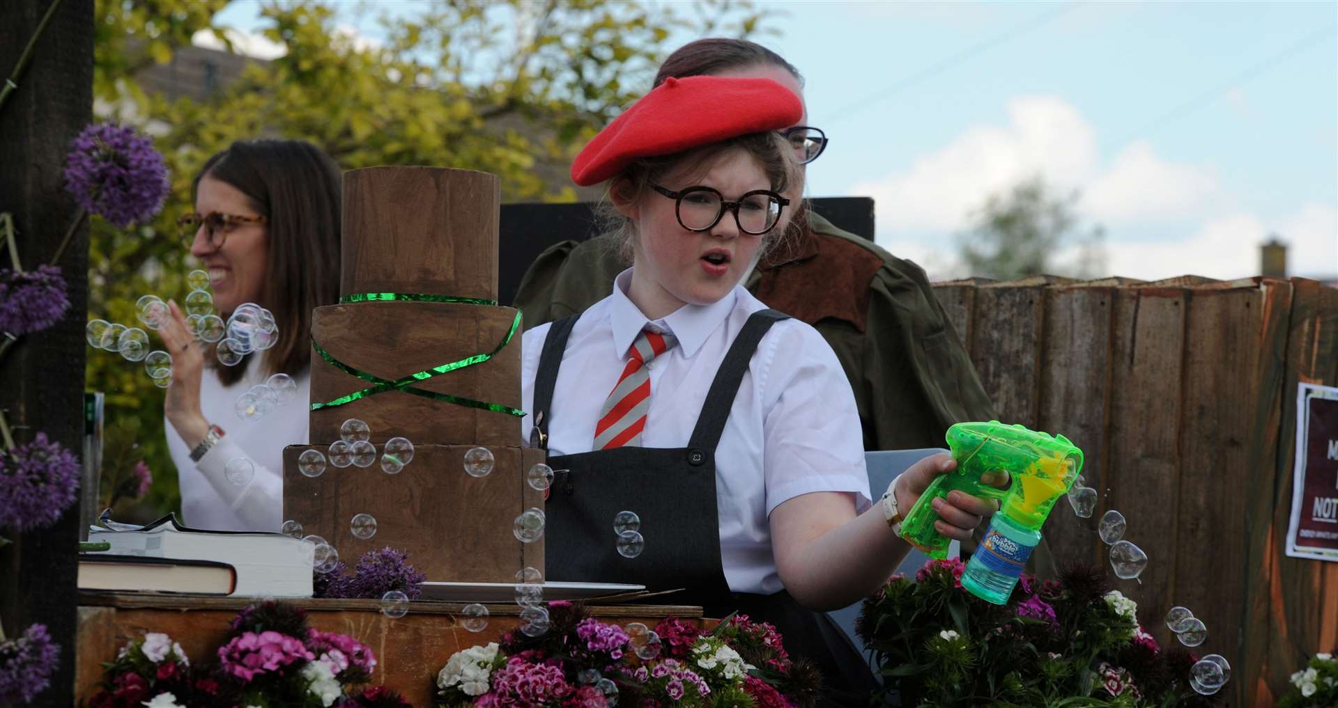 The Matilda themed float blows bubbles at the spectators