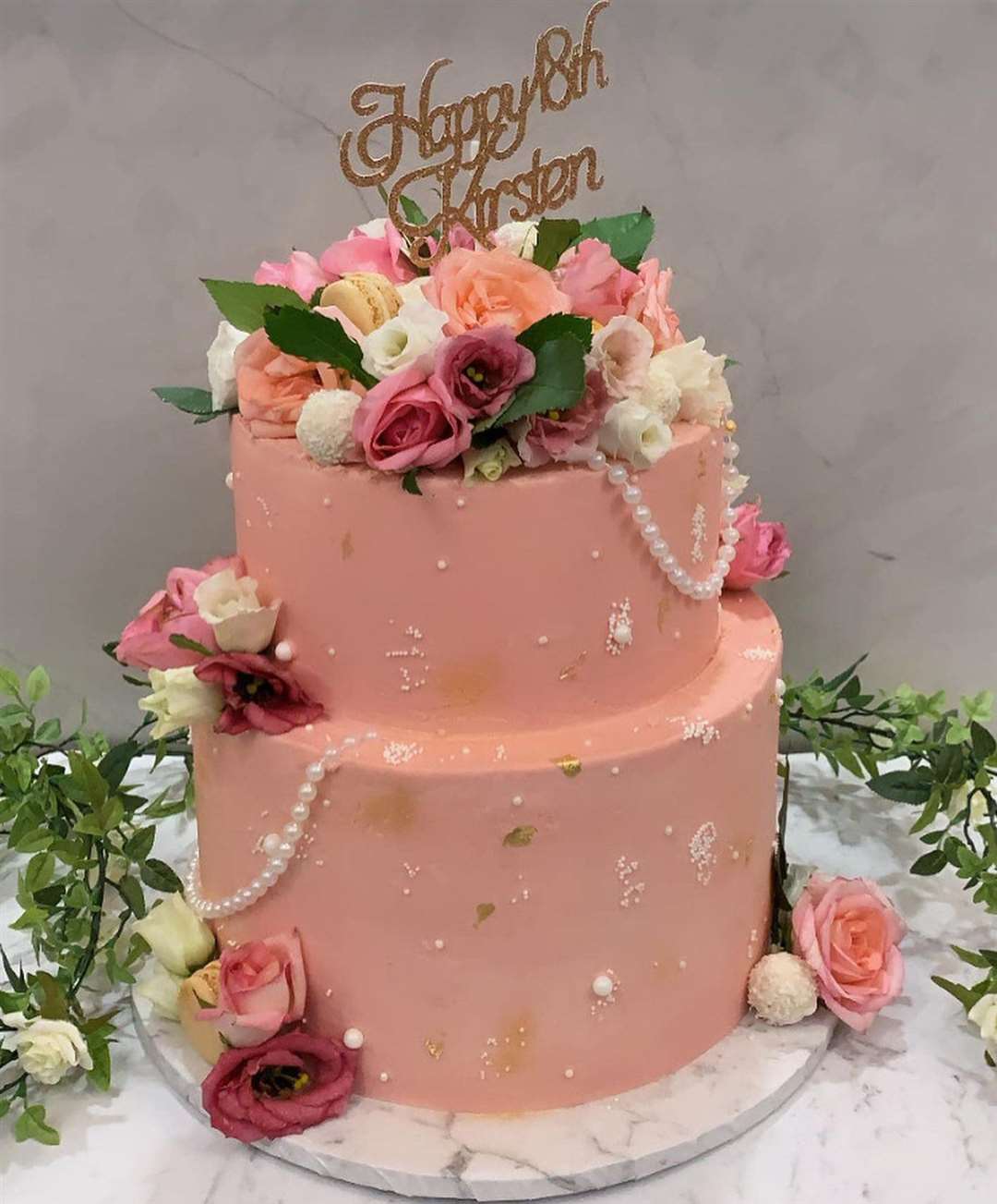 A classy design featuring pearls and roses