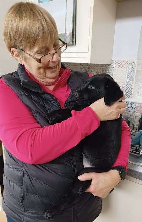 Where it all began: Puppy raiser Ann Colwell with the lovely Rita when she was tiny