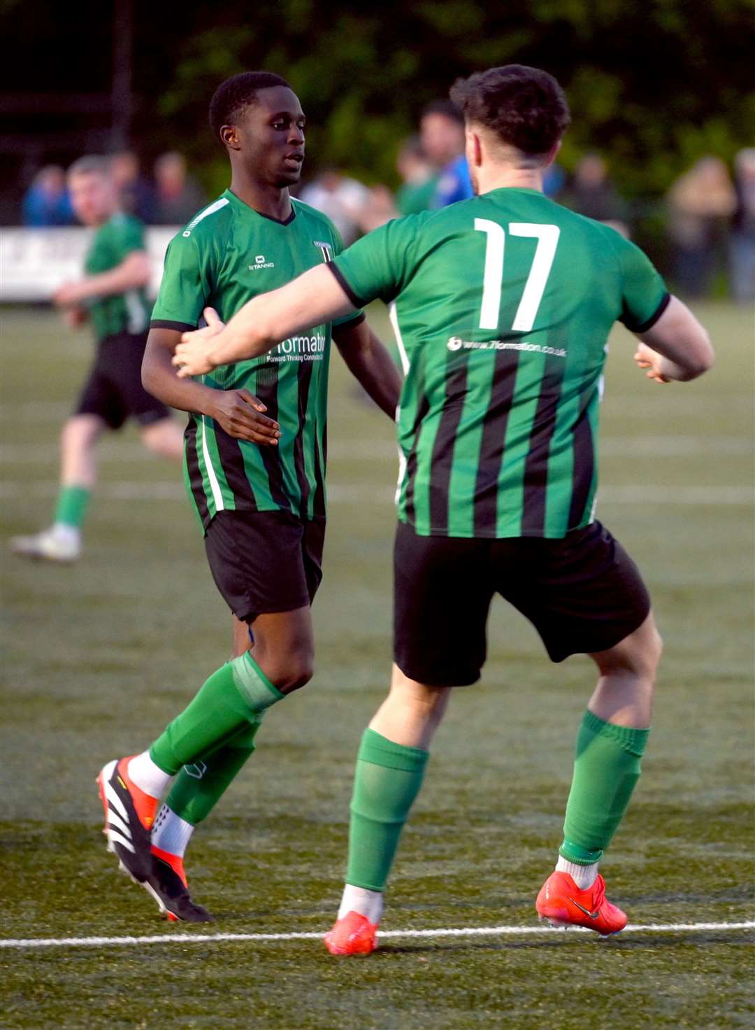 March (Blue) v Blackstones (Green and Black) in the final of the Hinchingbrooke Cup Blackstones scoring to make it 1-1