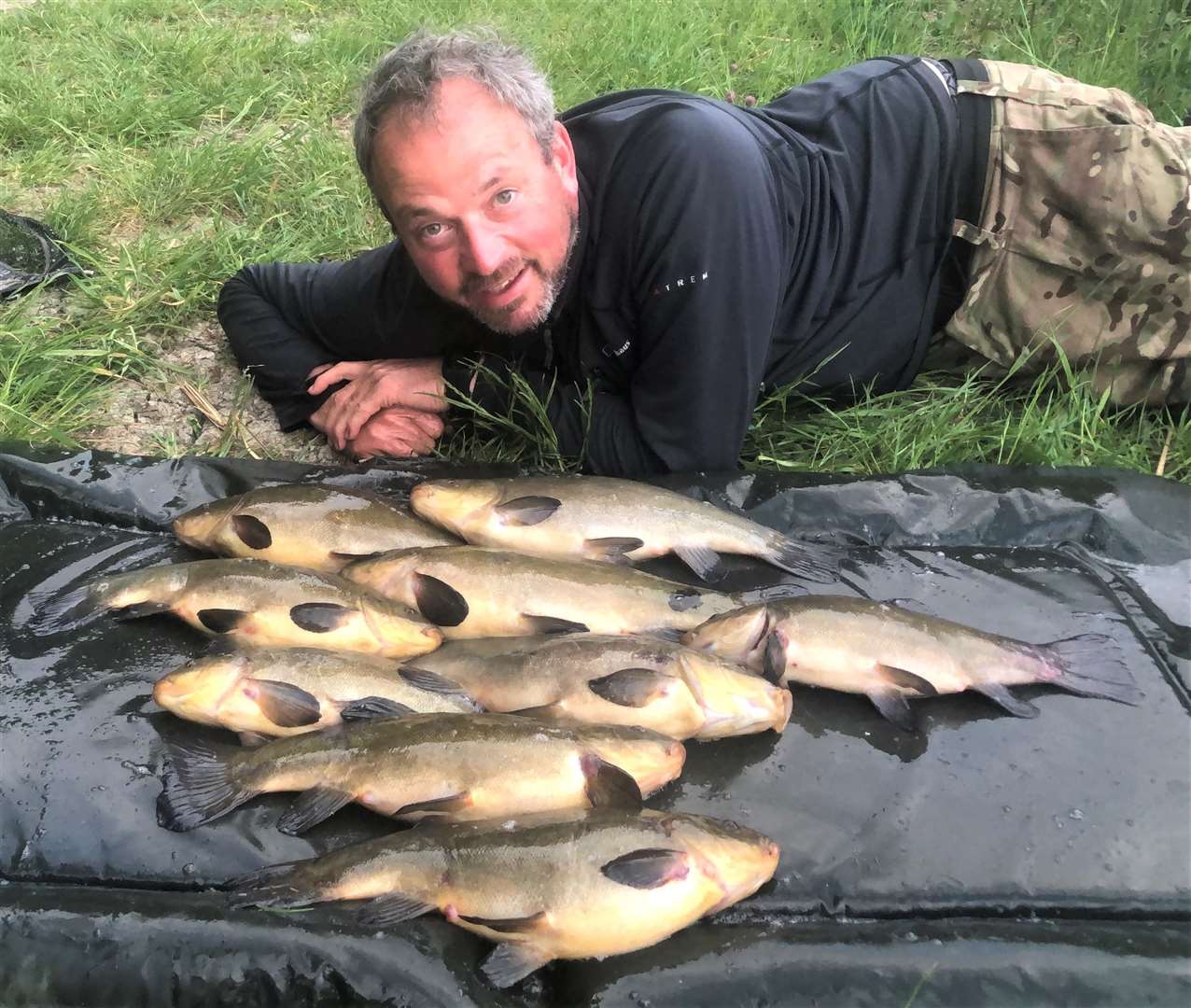 Grantham angler Chris Toon with a fabulous catch of tench, taken recently from the Grantham Canal in the Woolsthorpe area. (57000795)