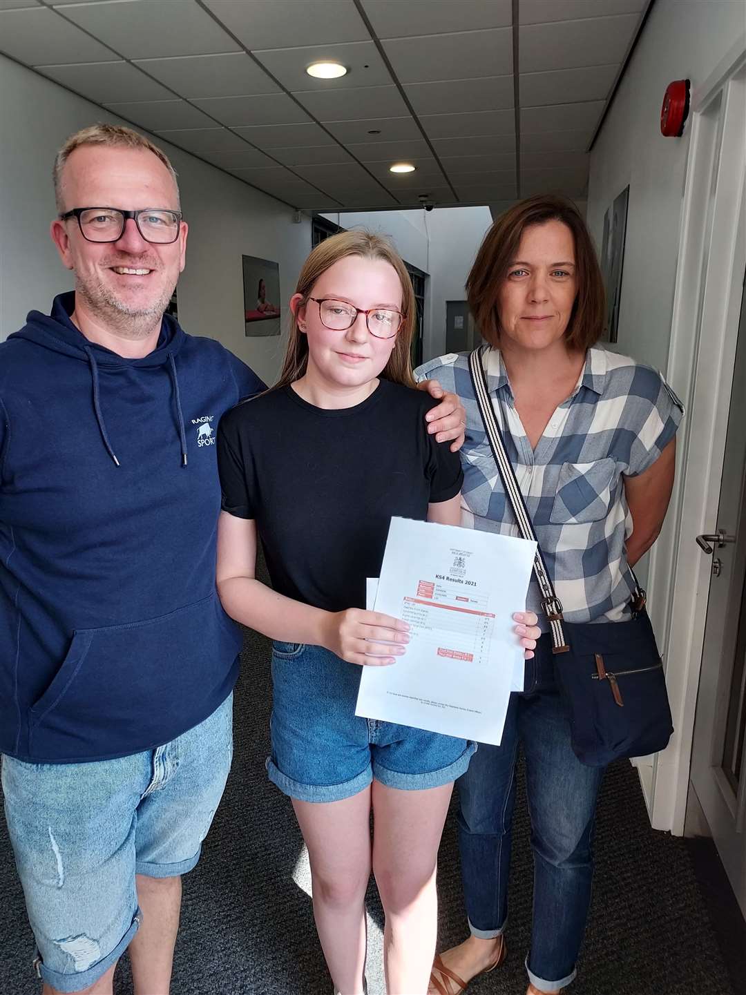 Katie Johnson with her proud parents (50157033)