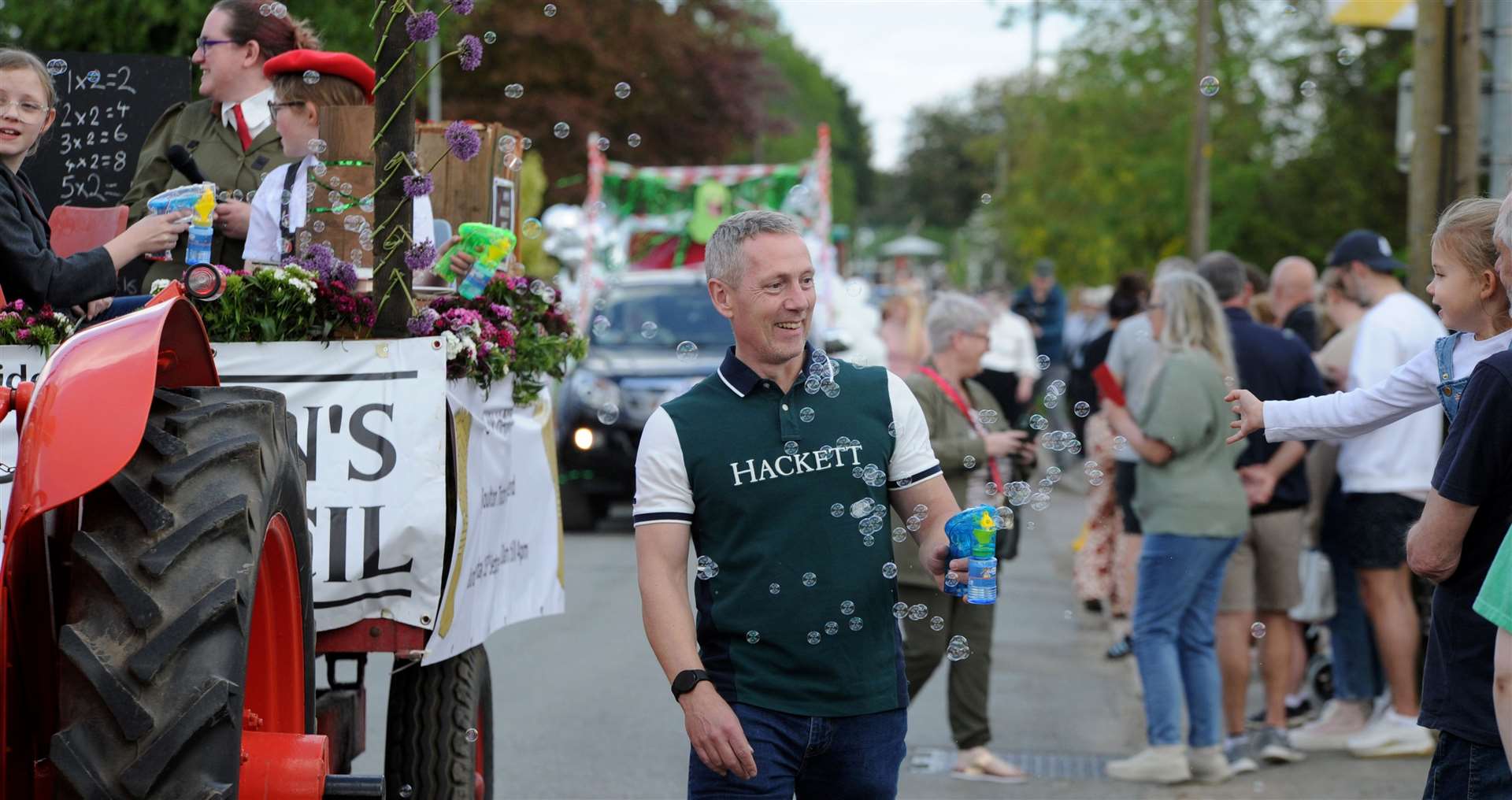The streets were lined with people enjoying looking at the floats
