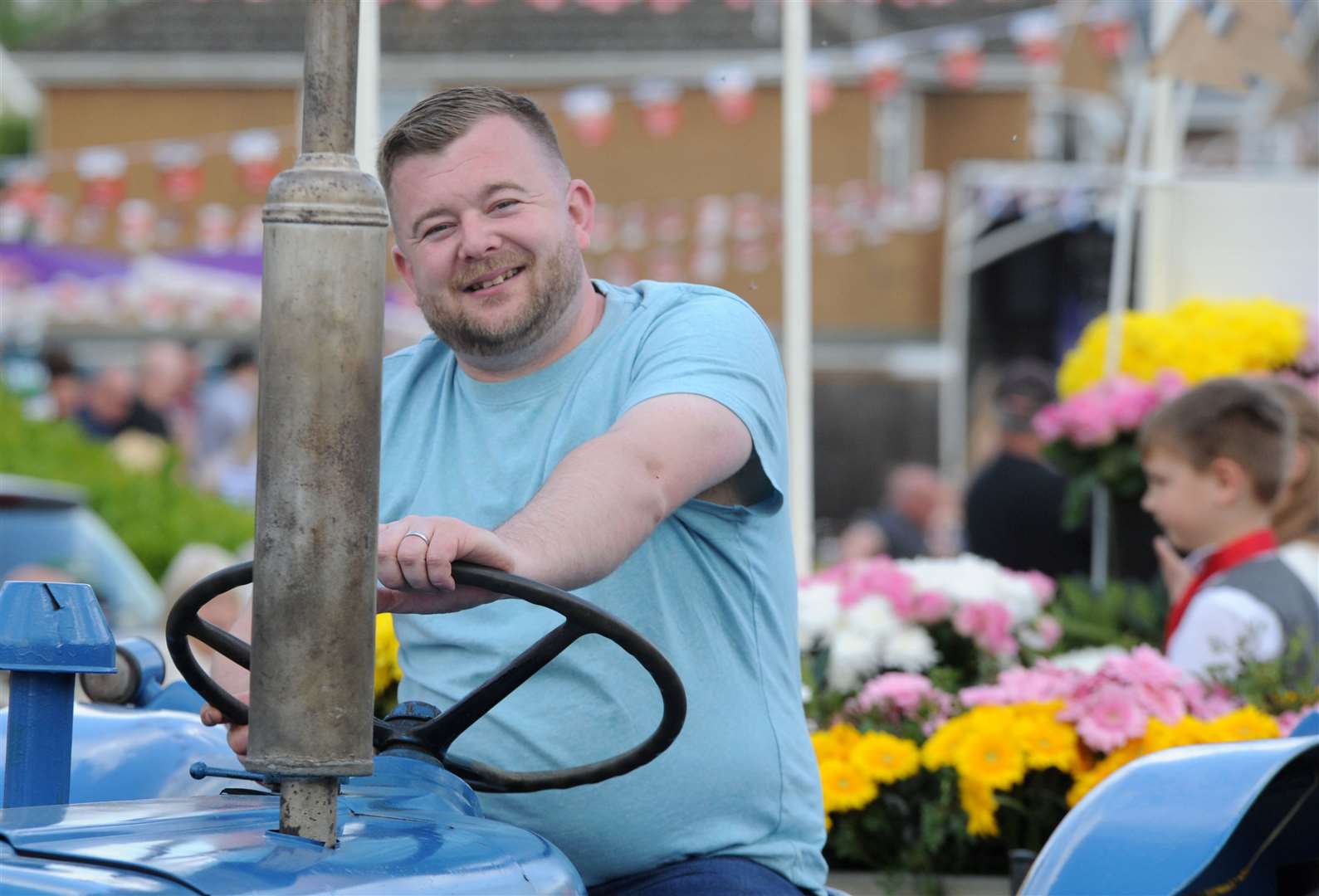 A big smile from this tractor driver