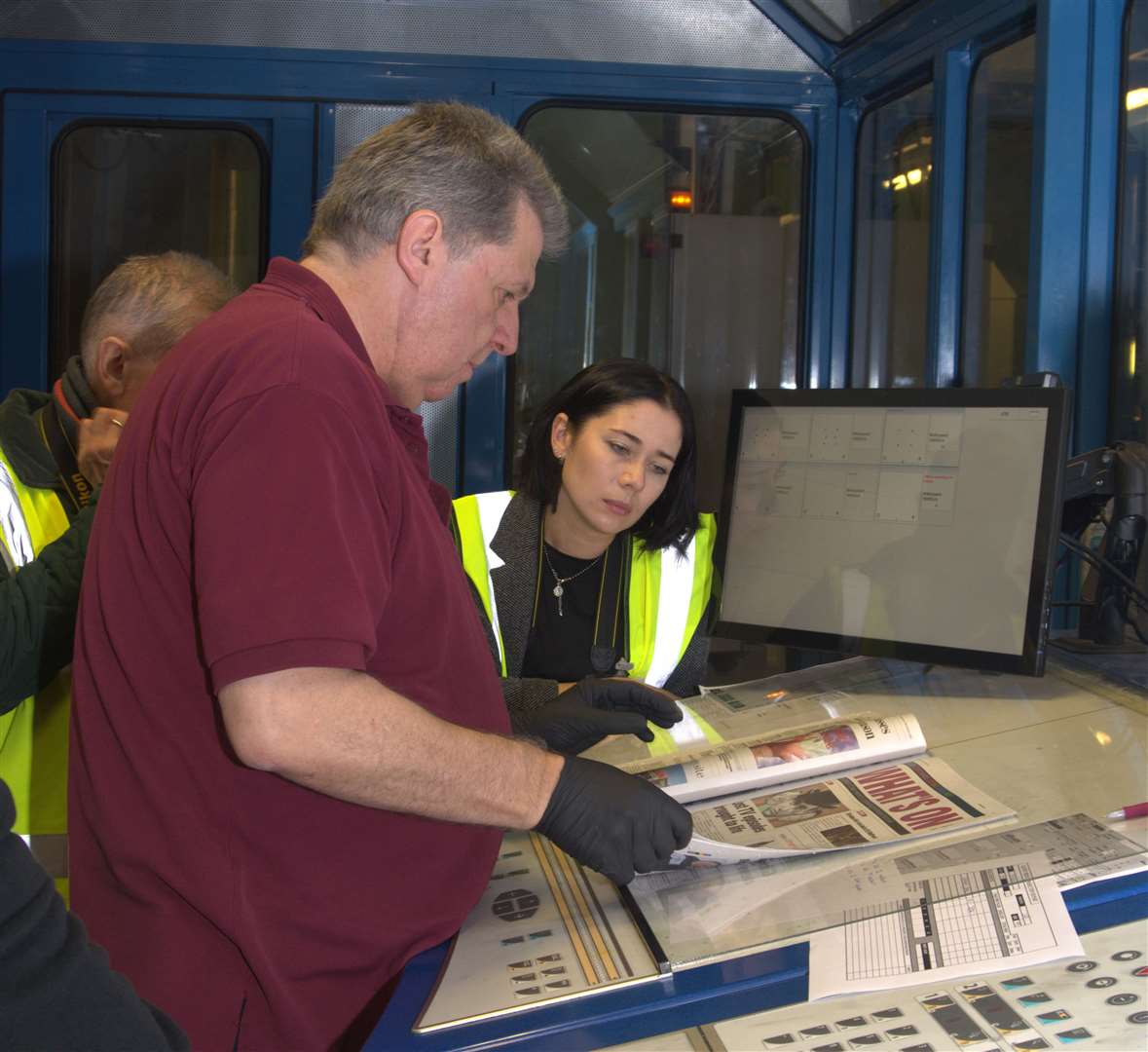 Chris Fordham from Iliffe Print shows Grantham College students the newspaper printing process