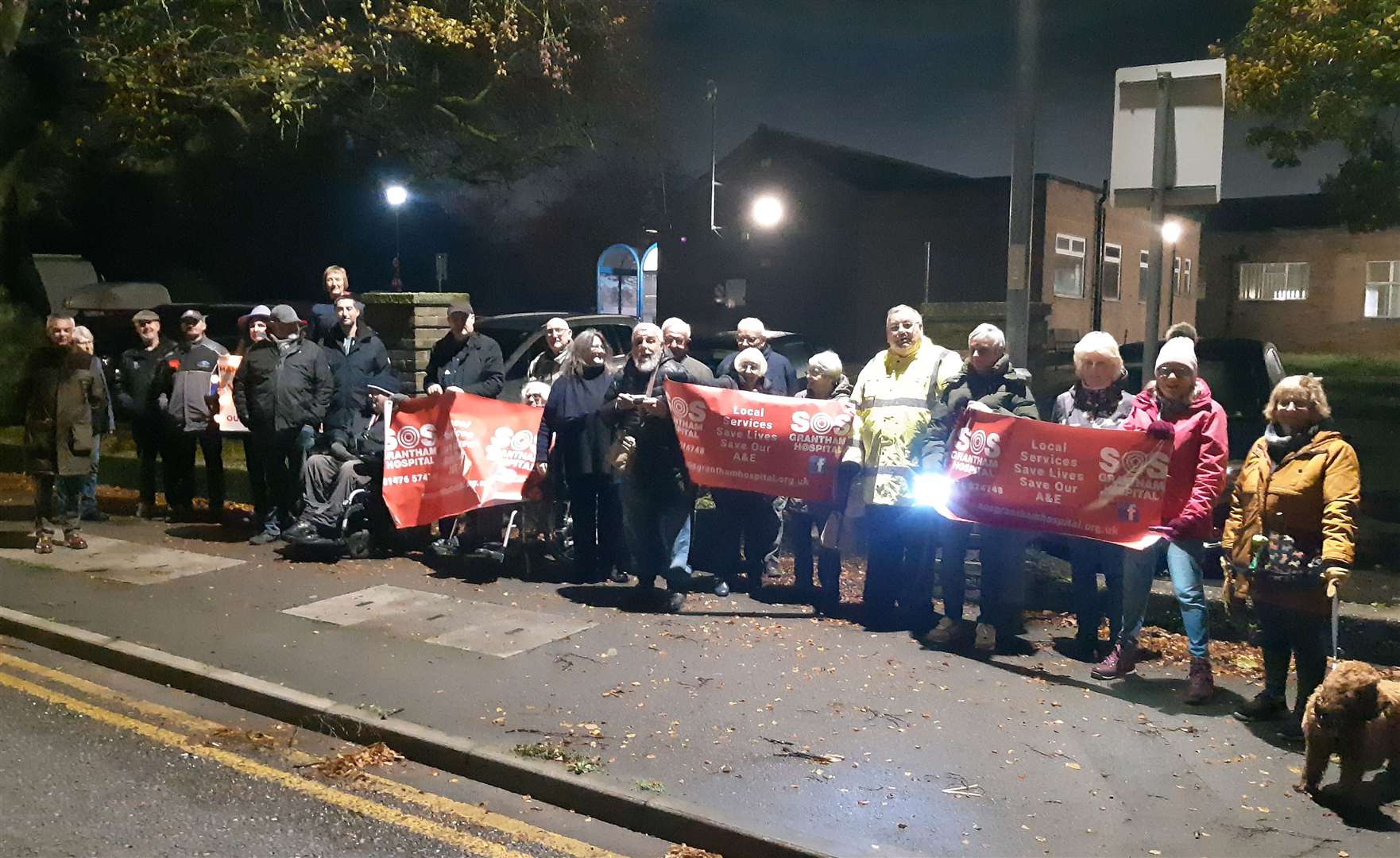 People take part in the vigil on the day an urgent treatment centre replaced Grantham A&E.