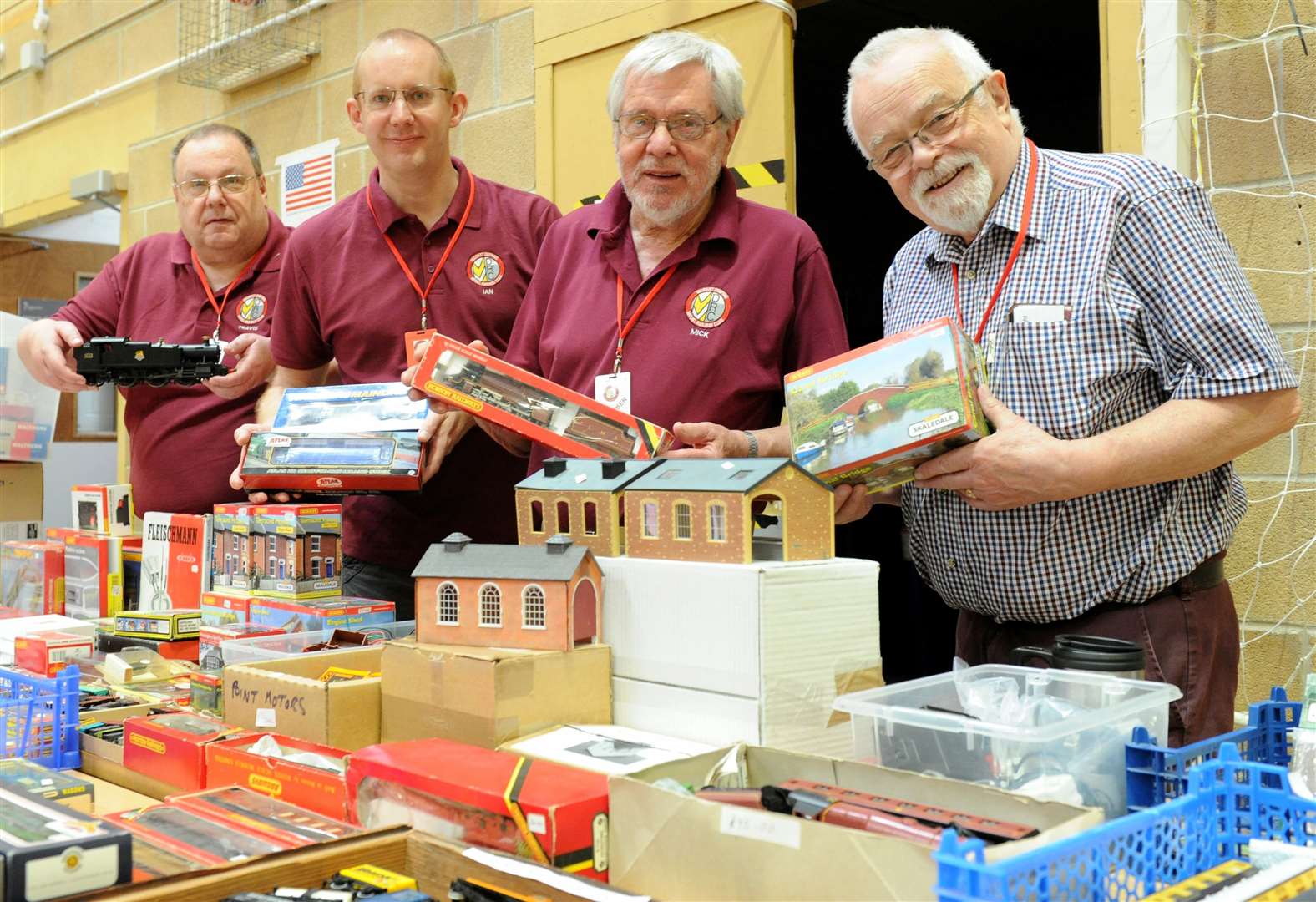 From left, Travis Martin, Ian Grey, Mick Quinn and Peter Stanton with second-hand items and donations for sale. Photo: Chris Lowndes