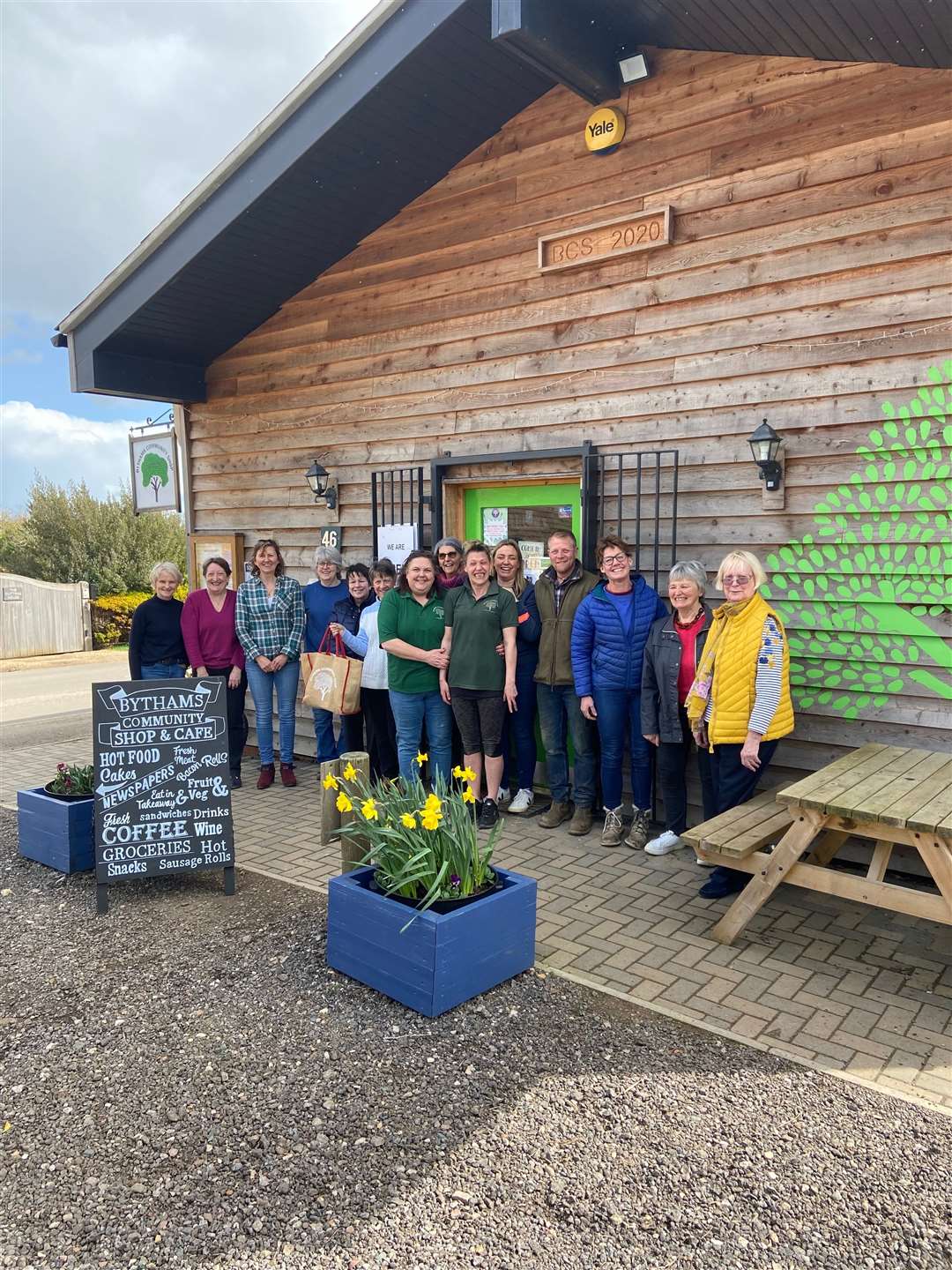 Fourteen out of the 52 volunteers who have helped the Bythams Community Shop and Cafe go from 'strength to strength'. (63171710)