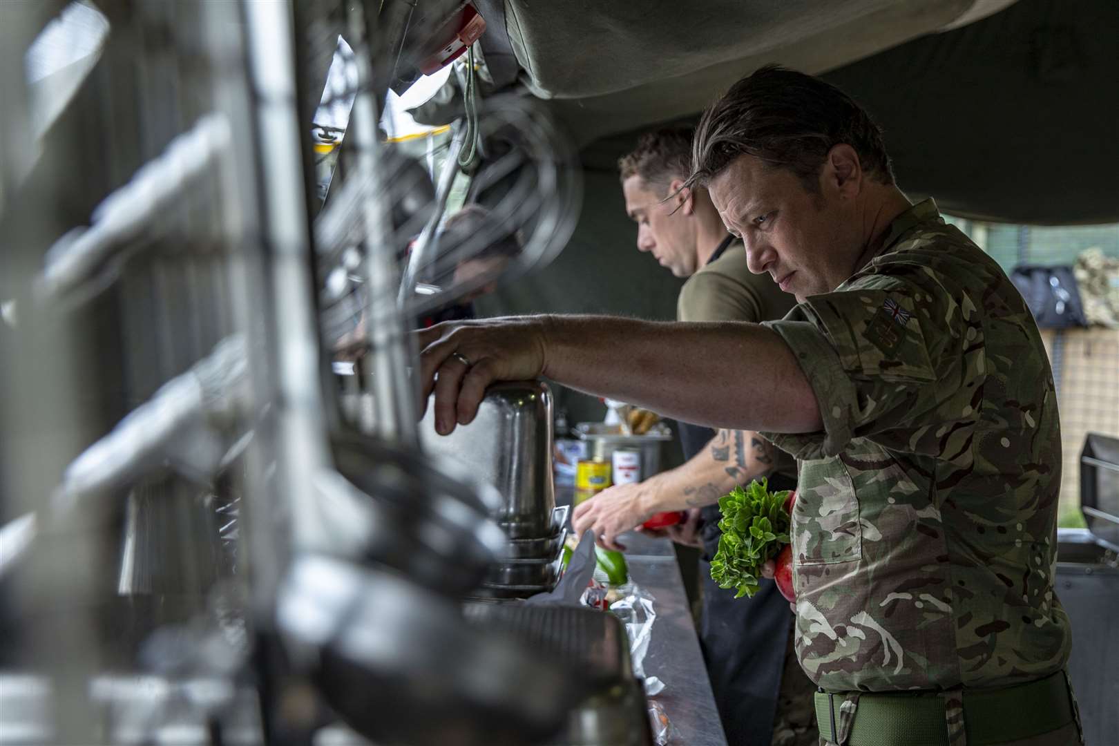 SAC Matthew Jose (background) and Jamie Oliver (foreground). Photo: SAC Kimberley Waterson