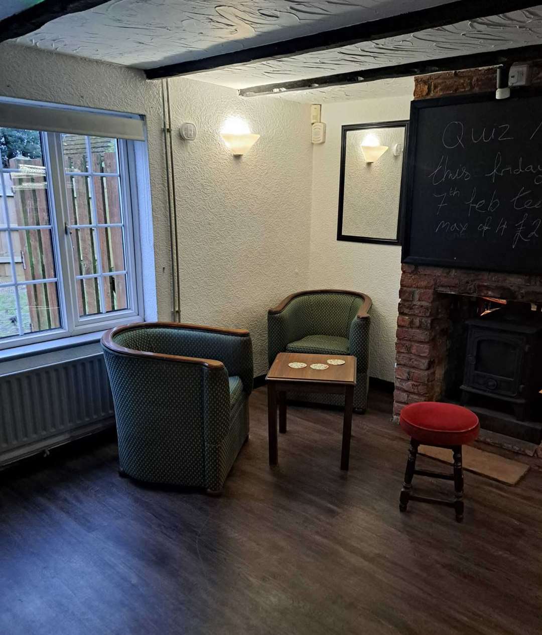 A cosy corner next to the fireplace
