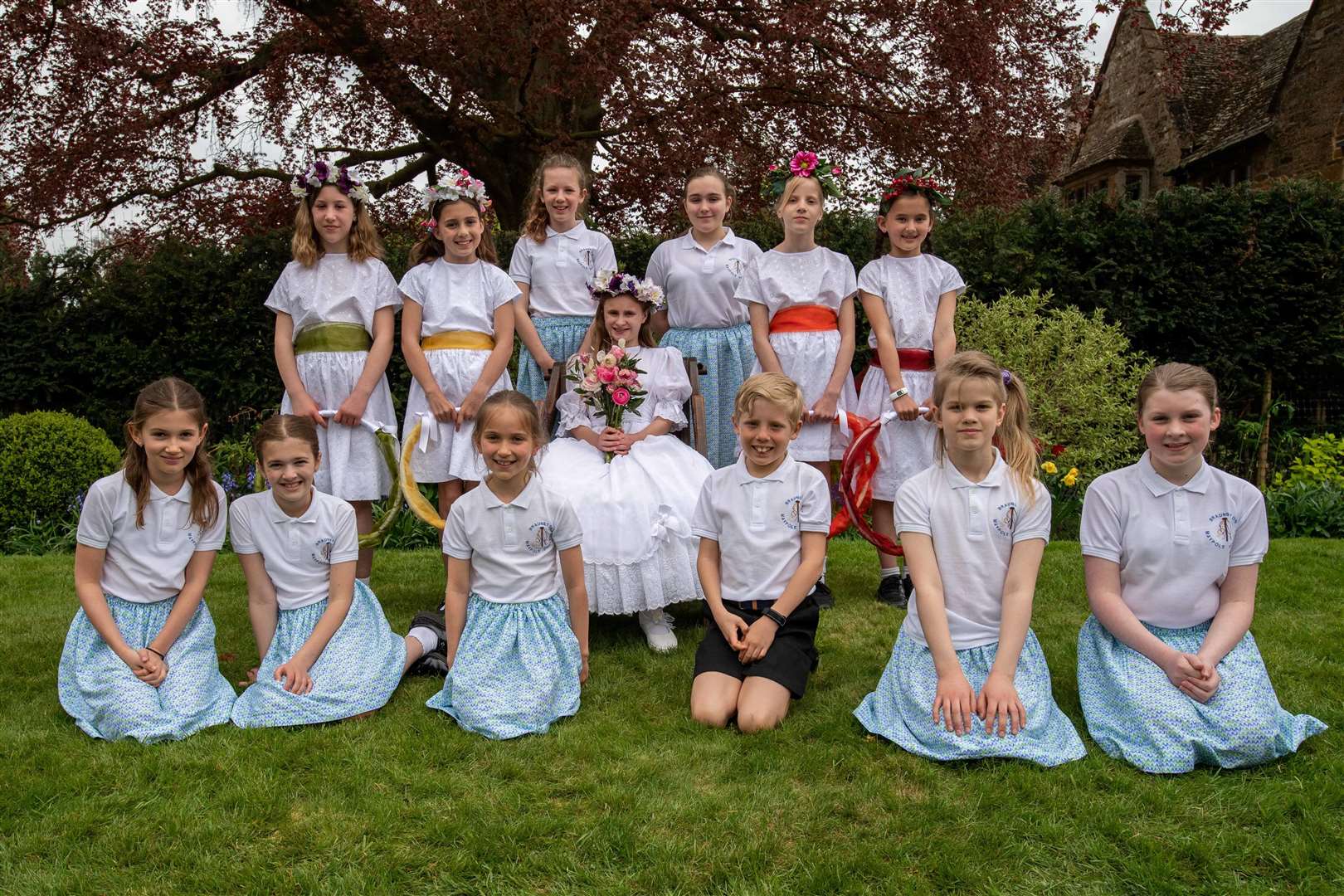 It was a special day for the May Queen, attendants and maypole dancers. Photo: Alan Walters
