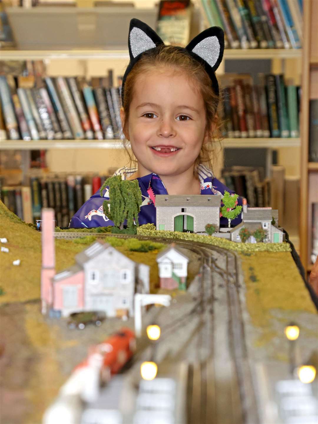 Six-year-old visitor Jemima enjoys a look at Market Deeping Model Railway Club Junior Group's exhibition