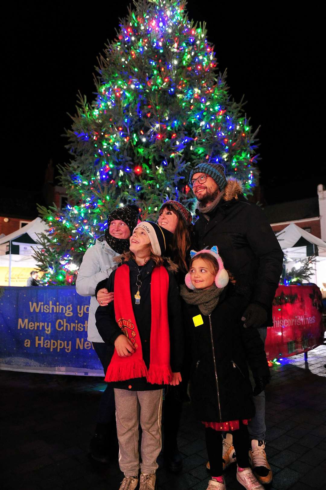A family enjoy the Spalding Christmas lights switch on. Photo: Chris Lowndes