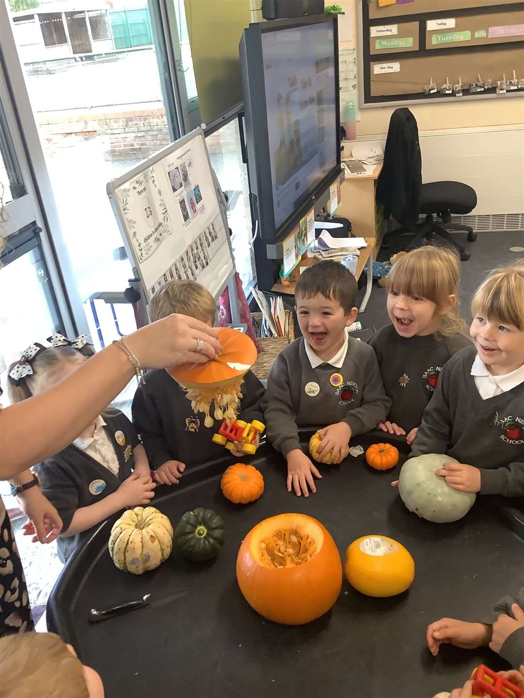 Happy children at Isaac Newton Primary School in Grantham.