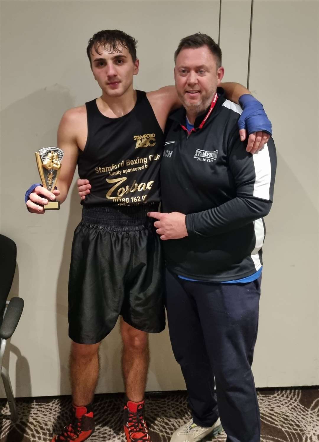 Matt Cross with head coach Mark Atherton.