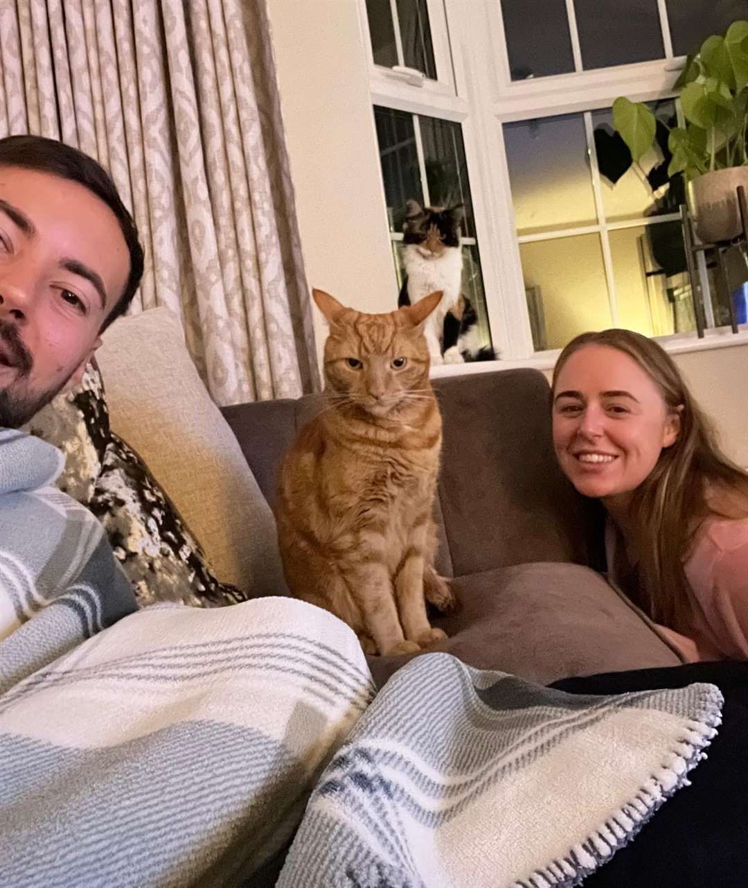 Antony and Sarah at home with Oliver (front) and Tinkerbell.