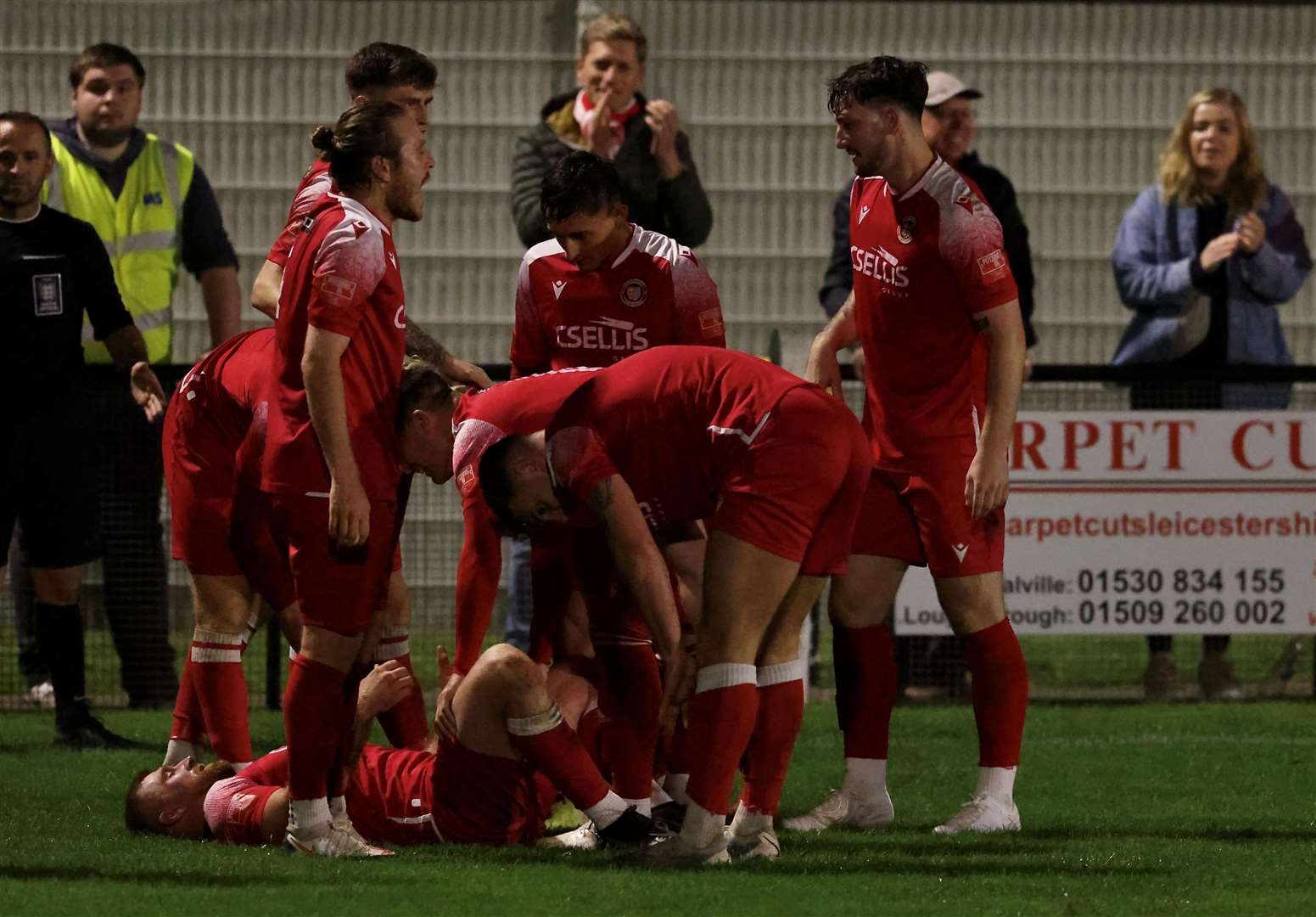 The Stamford players congratulate Joe Burgess. Photo: Rob O'Brien
