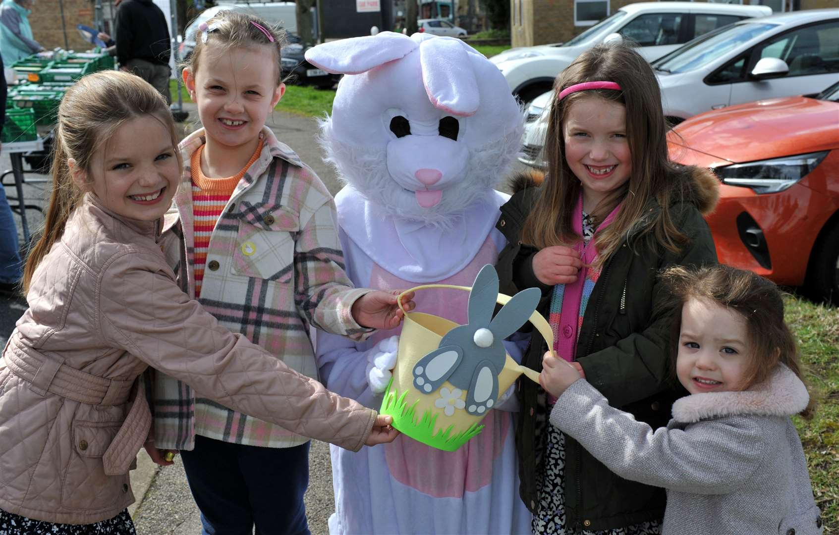 From left, eight-year-olds Isobel Musson and Alba Gould with the Easter Bunny, Edie Gould, 5, and Olivia Musson, 3. Photo: Chris Lowndes