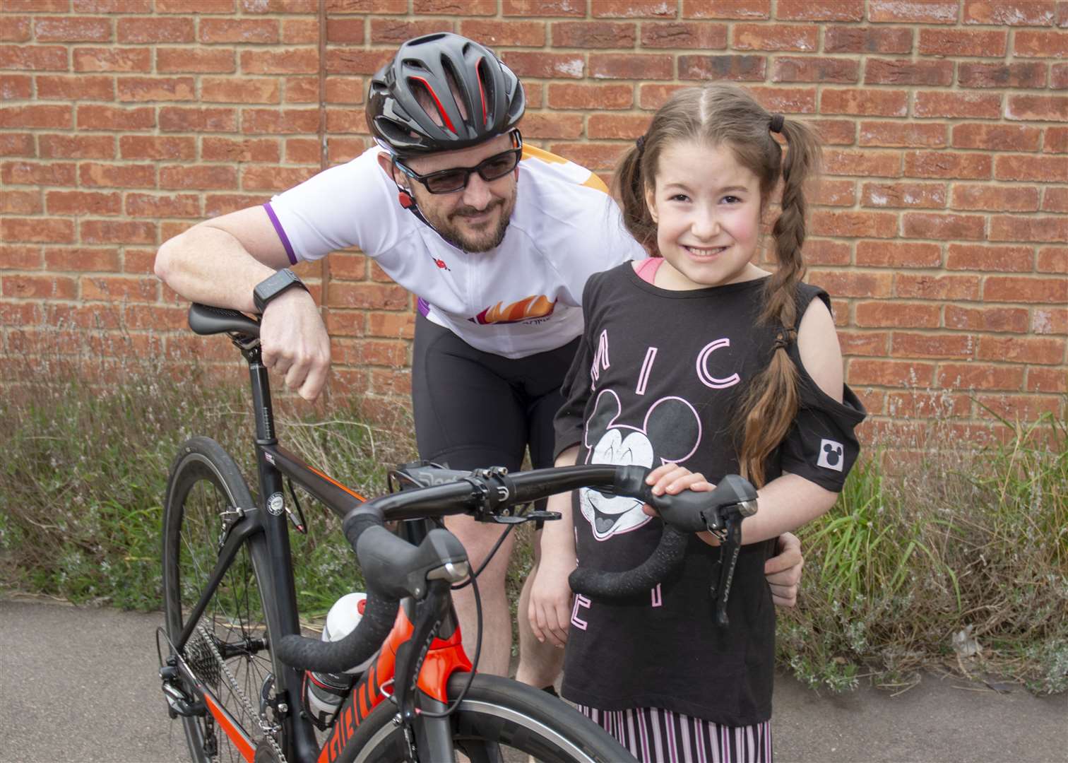 Tallulah Tyler and her uncle Ricky Tyler who is doing a charity bike ride for the Prader Willi Syndrome Association (8737080)
