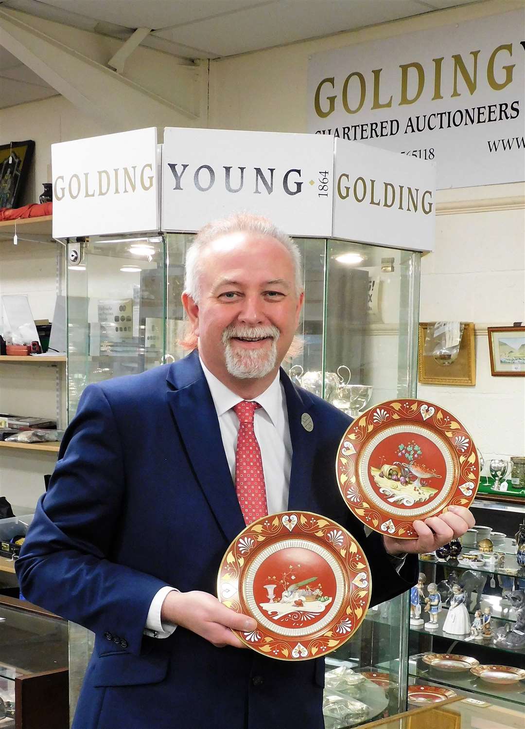 Colin Young with two of the plates. (55933299)