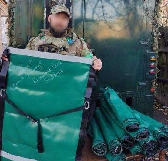 A Ukraine soldier with the stretcher made in Colsterworth