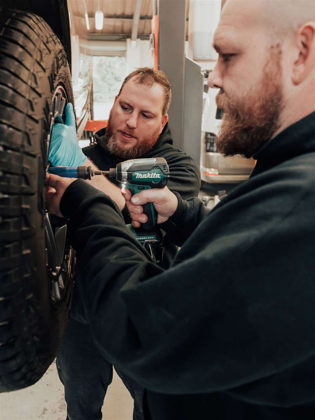 Build technicians Paul and Aaron working on one of the vehicles. Photo: Nick Caro Photography
