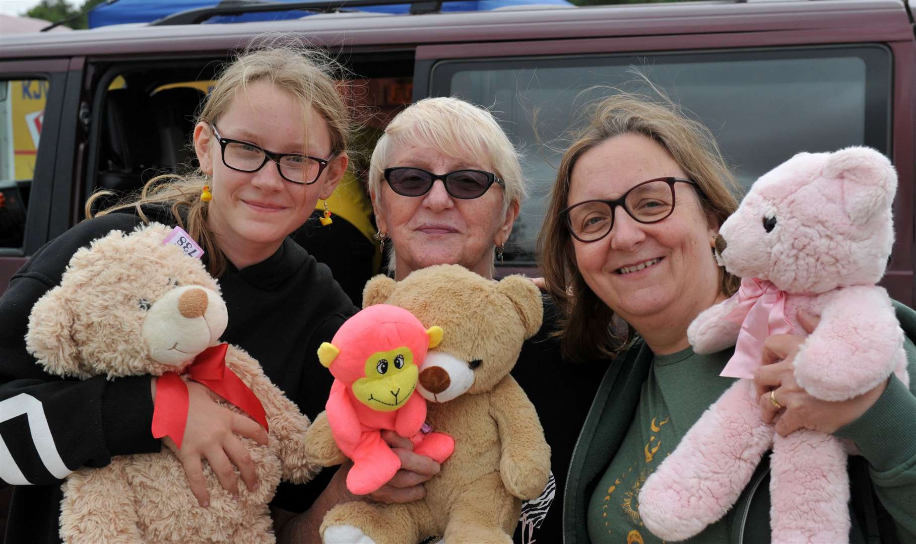 Lacey Green,12, Denise Elsam and Karen Taylor on Little Miracles stall