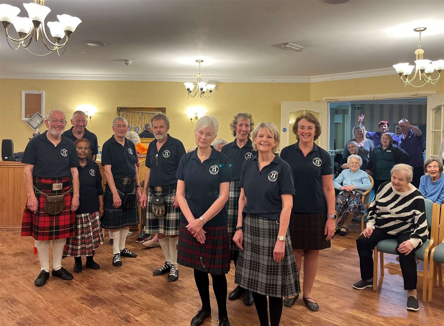 Scottish country dancers performed at care homes for St Andrews Day.